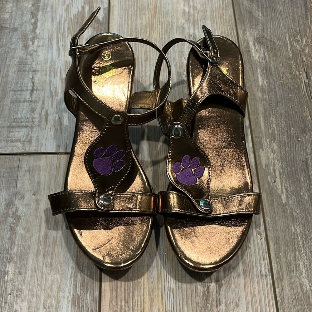 Never worn DBA gold wedges with removable purple tiger paw patches